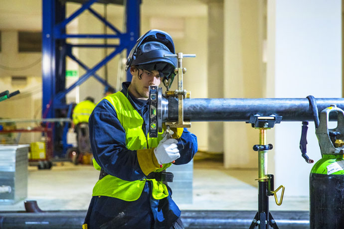 Plumber during installation